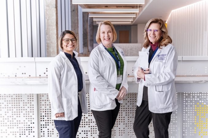 Three female board-certified family nurse practitioners from the Rockhurst MSN-FNP program